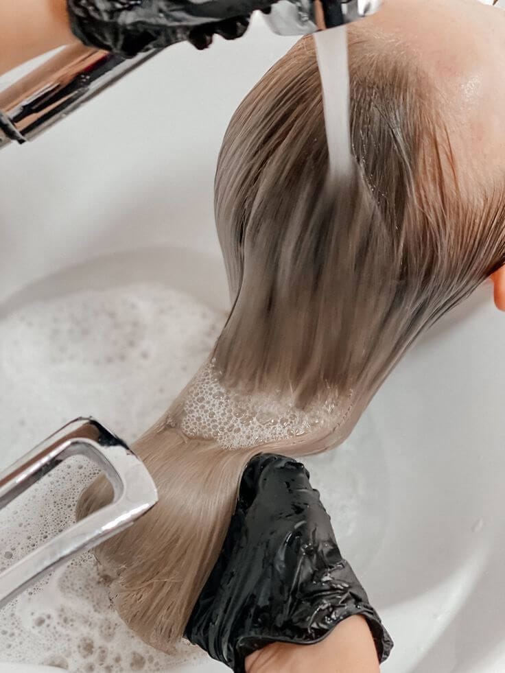 Lavado capilar profesional Fermín Peluqueros Oviedo